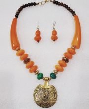 Gold Yellow Wonderful Classy Beads Necklace Set with Dokra Art Round Pendant